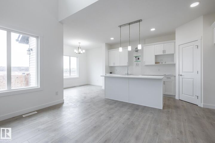 Property Photo:  319 157 Avenue NE  AB T5K 6K8 