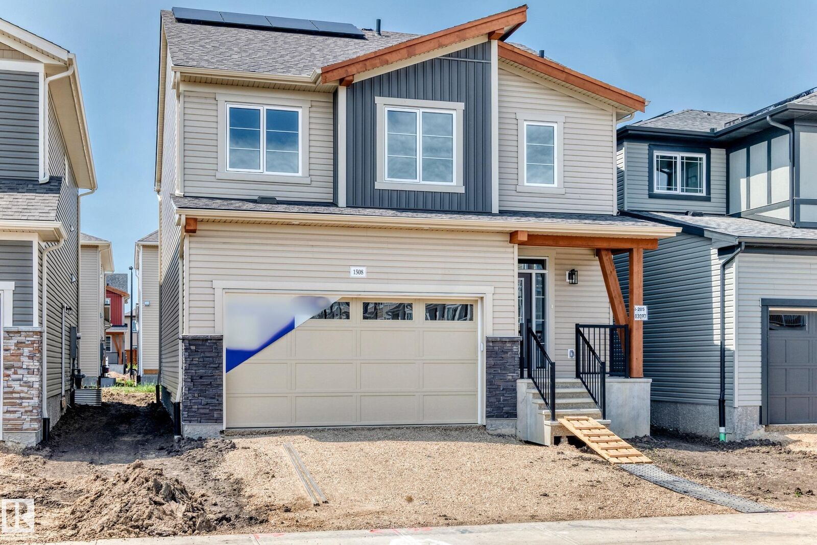 Property Photo: 1508 205 Street NW AB T6M 3E7