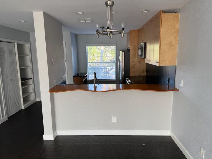 Property Photo:  2568 Woodgate Boulevard 205  FL 32822 