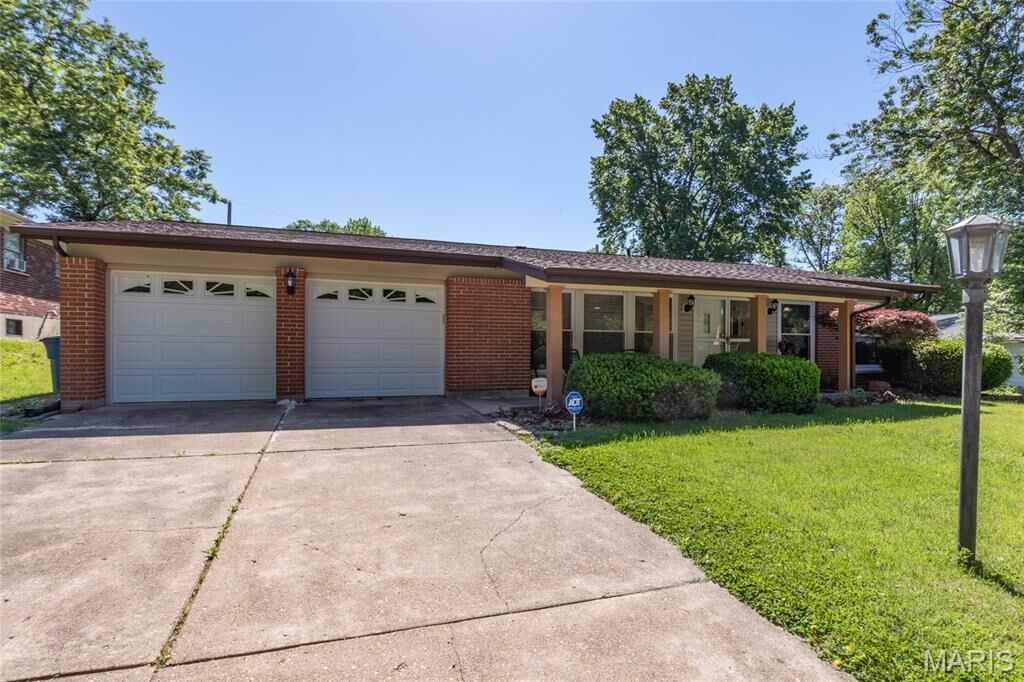 Property Photo:  1204 Hobson Drive  MO 63135 