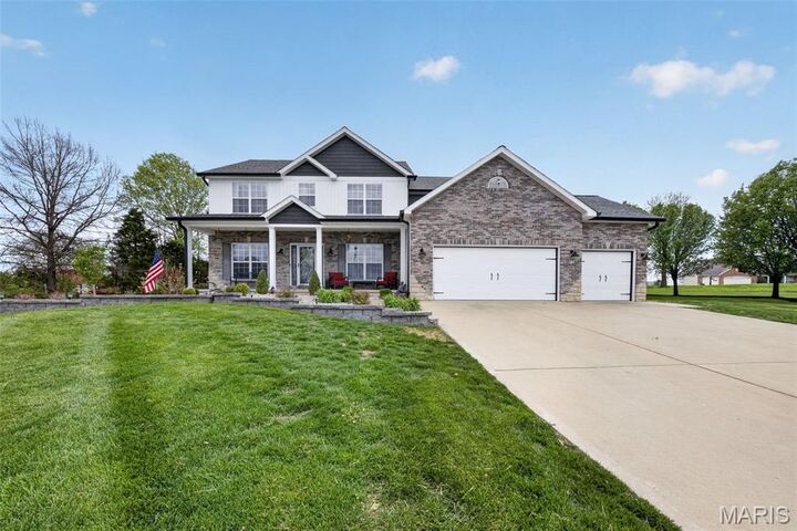 Property Photo:  321 Red Wing Court  MO 63379 