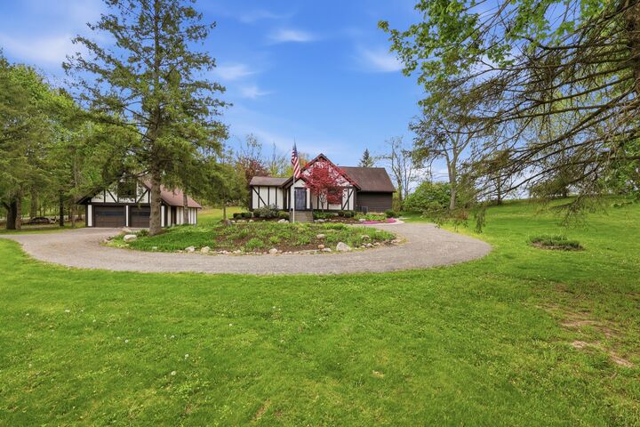 Property Photo: 5575 Giles Avenue NE MI 49341