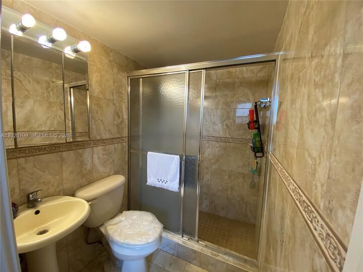 Property Photo:  5050 NW 7th St 312  FL 33126 