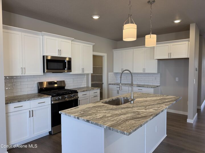 Property Photo:  7038 N Coeur Terre Blvd  ID 83815 