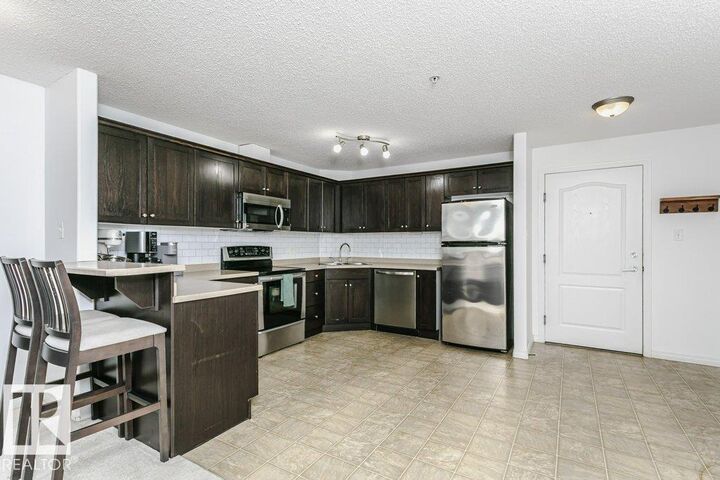 Property Photo:  7331 South Terwillegar Drive NW 6305  AB T6R 0L9 