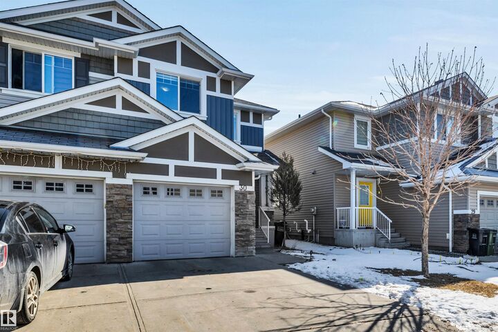 Property Photo: 655 Tamarack Road NW 30 AB T6T 0N4