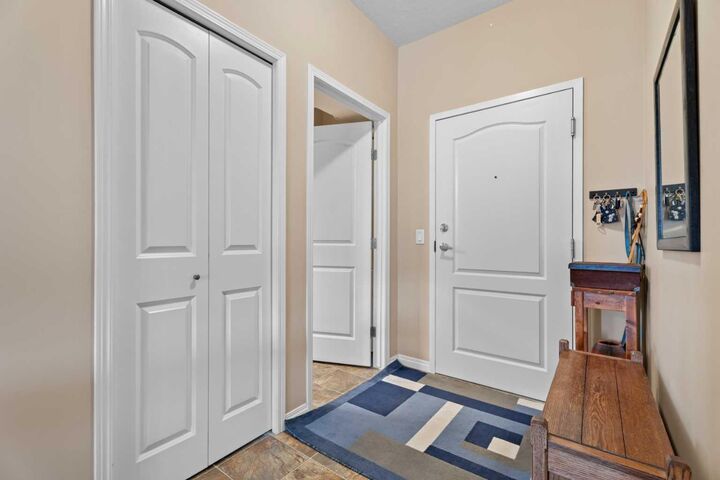 Property Photo:  43 Sunrise Loop SE 215  AB T1V 0A8 