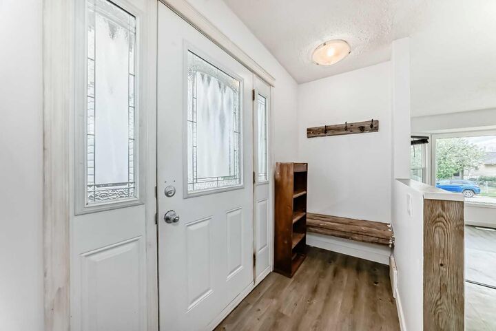 Property Photo:  323 Falwood Way NE  AB T3J 1A9 