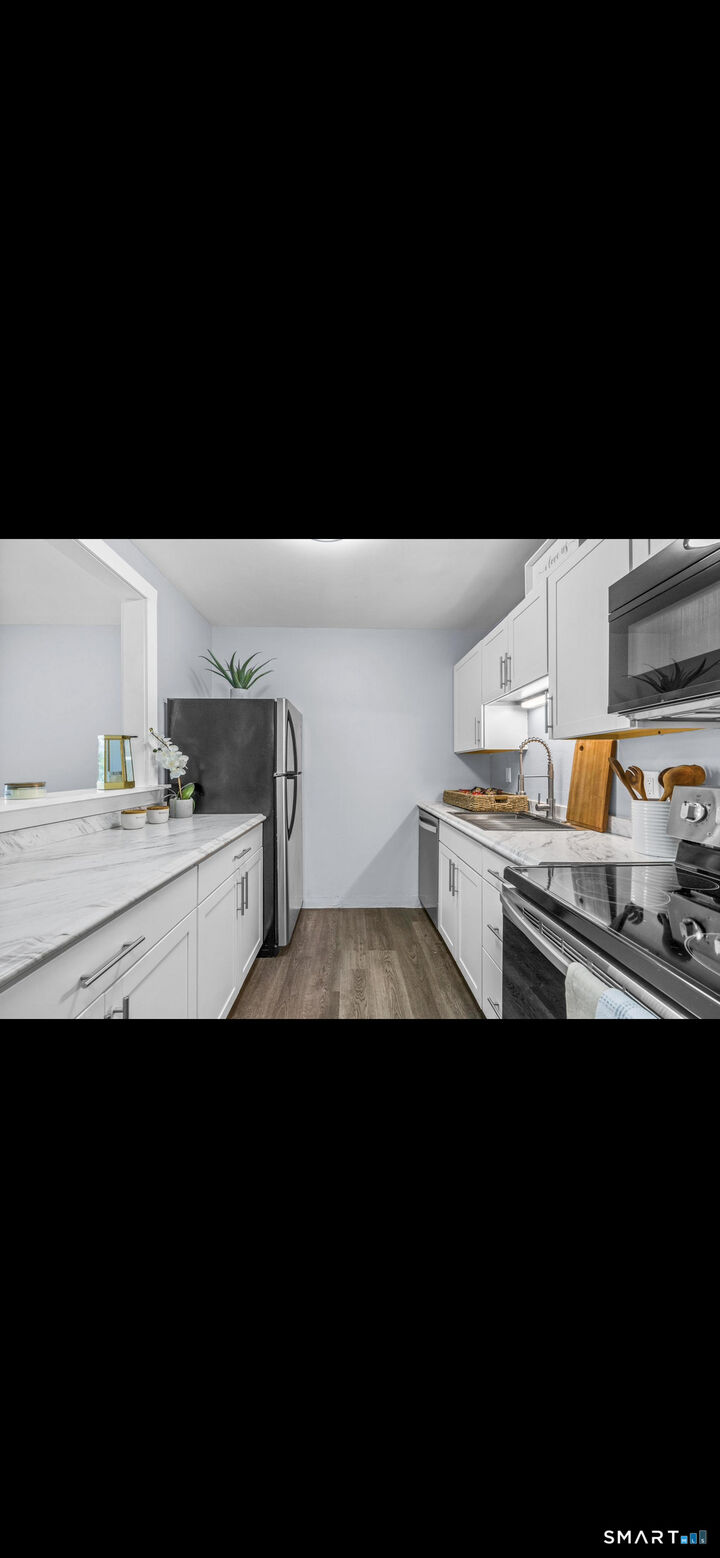 Property Photo: 446 Hollister Street A16 CT 06615