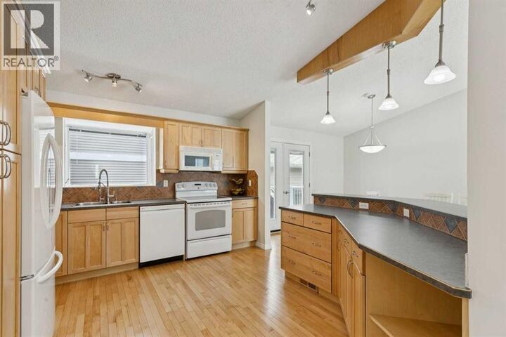 Property Photo:  44 Scenic Cove Circle Northwest  AB T3L 1N1 