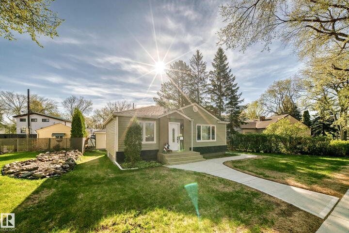 Property Photo:  11303 60 Street NW  AB T5W 3Z2 