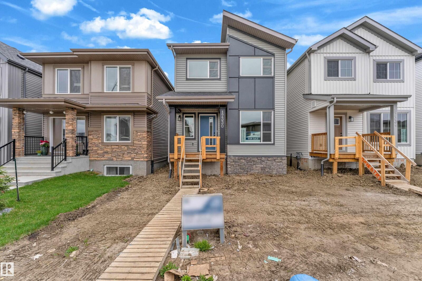 Property Photo:  17330 6A Street NE  AB T5Y 4E8 