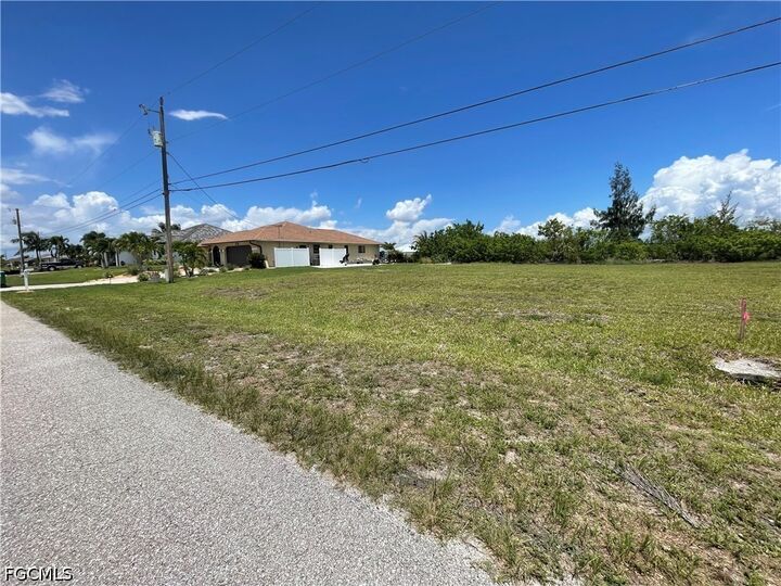 Property Photo:  825 NW 33rd Place  FL 33993 