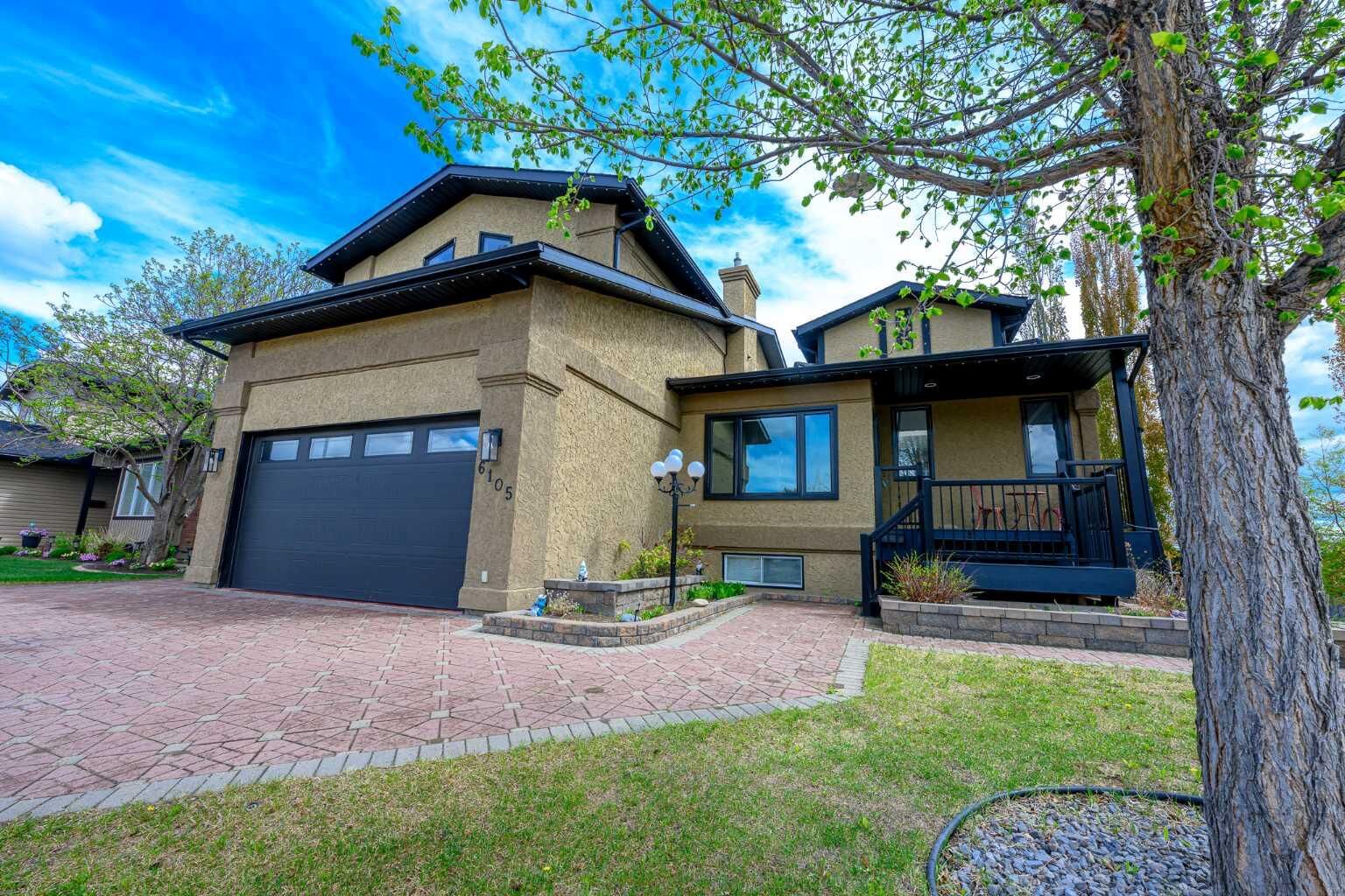 Property Photo:  6105 95 Street  AB T8W 2C9 