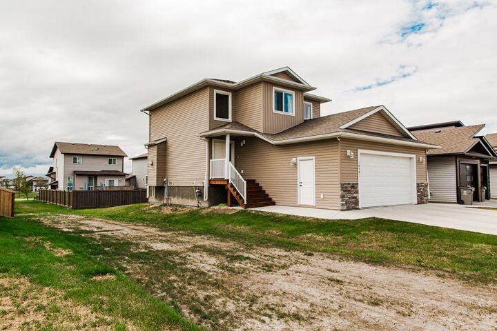 Property Photo:  10301 128 Avenue  AB T8V 6S9 