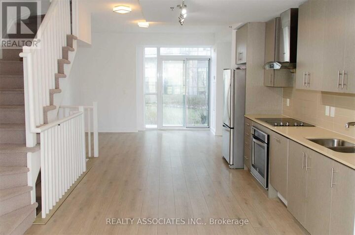 Property Photo: 215 Bonis Avenue Th19 ON M1T 3W6