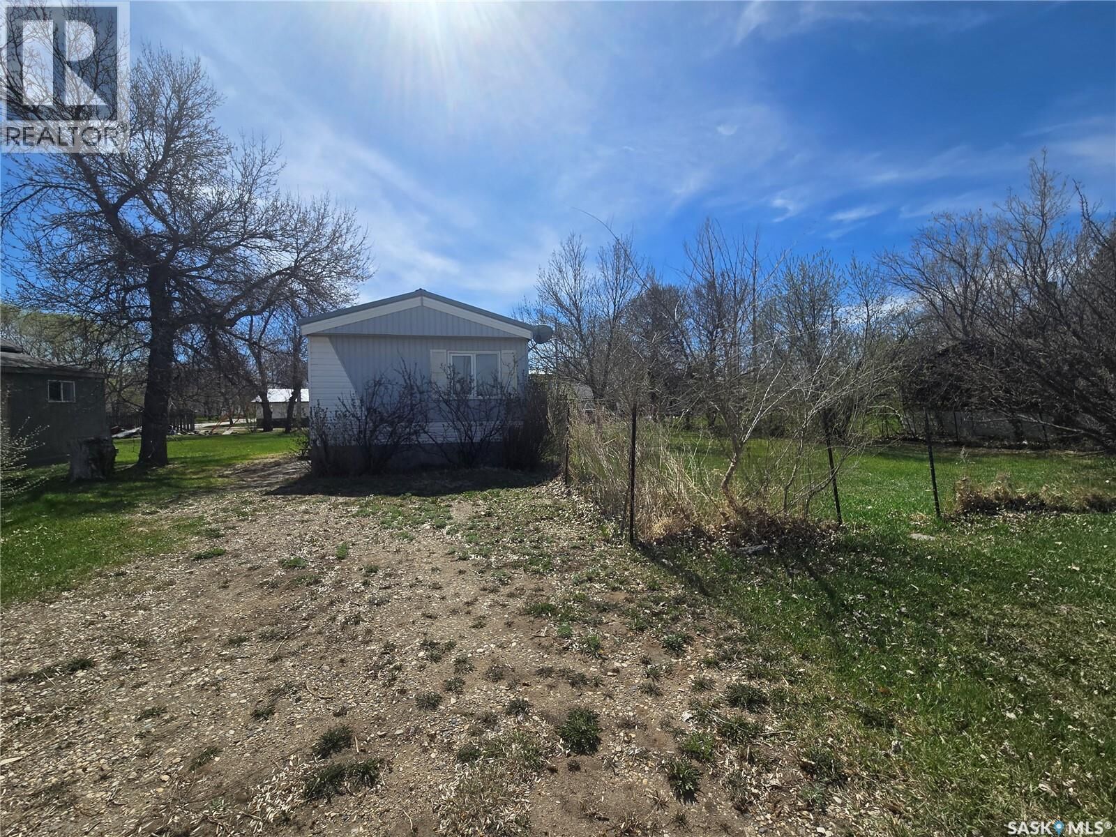 Property Photo:  212 Railway Avenue N  SK S0C 1N0 