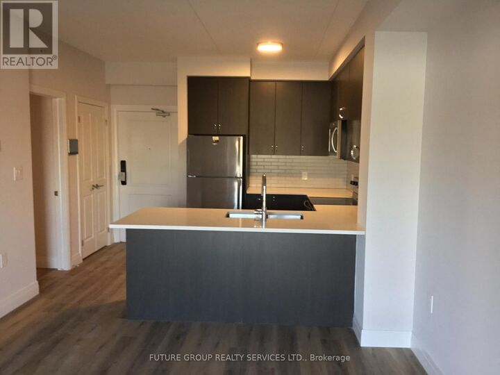 Property Photo:  6415 Regional Rd 25 203  ON L9T 2W3 