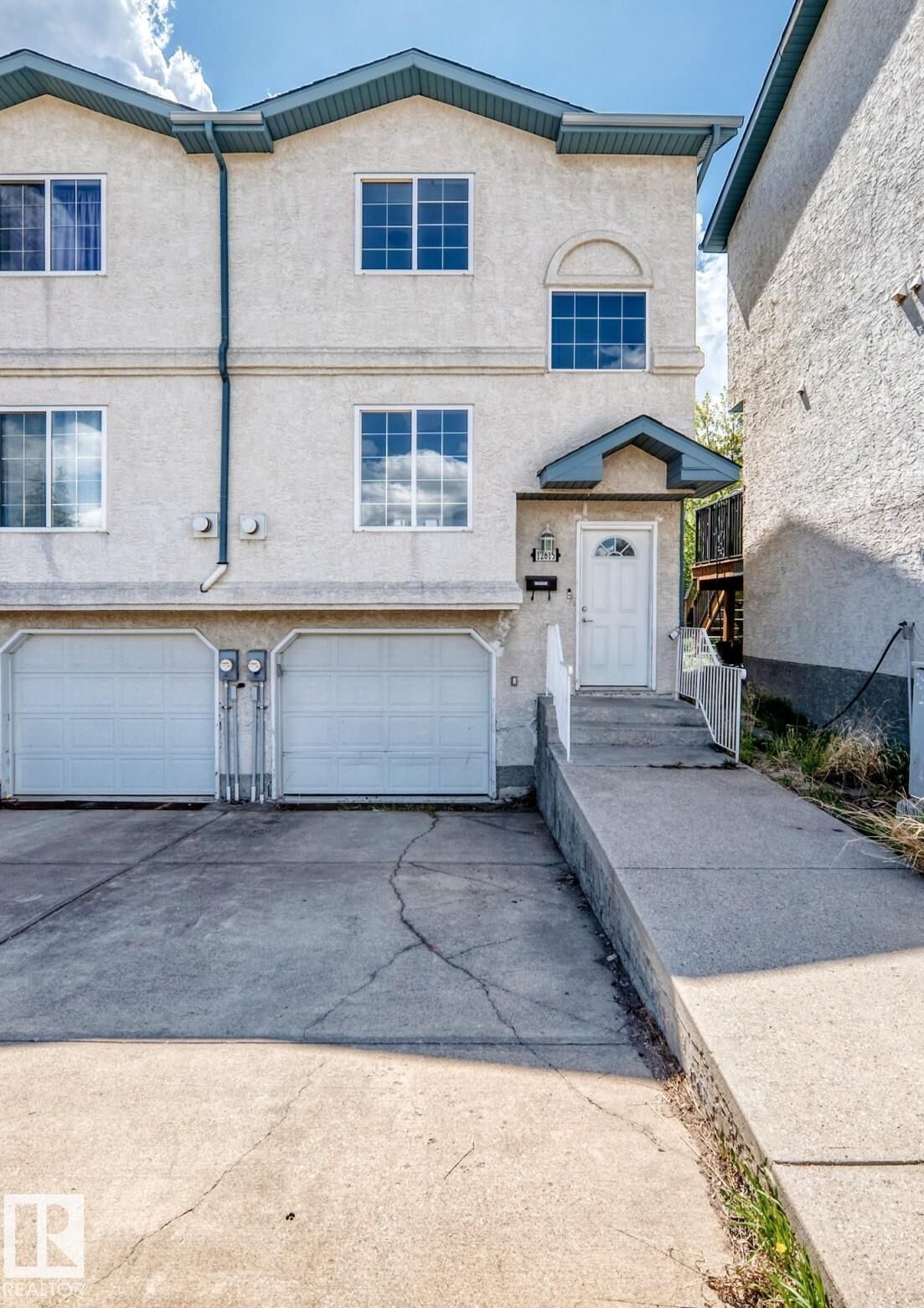 Property Photo:  12615 47 Street NW  AB T5A 5B1 