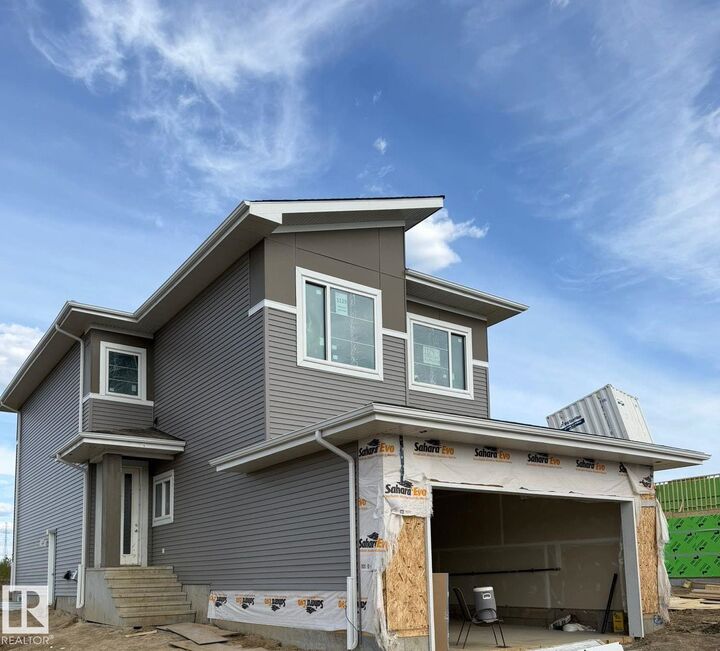 Property Photo:  1129 Starling Drive NW  AB T5S 0V4 