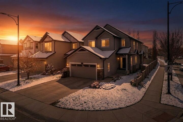 Property Photo:  6159 12 Avenue SW  AB T6X 0M5 