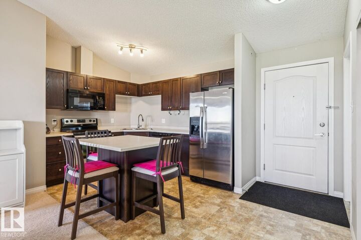 Property Photo: 7327 South Terwillegar Drive NW 7419 AB T6R 0L8