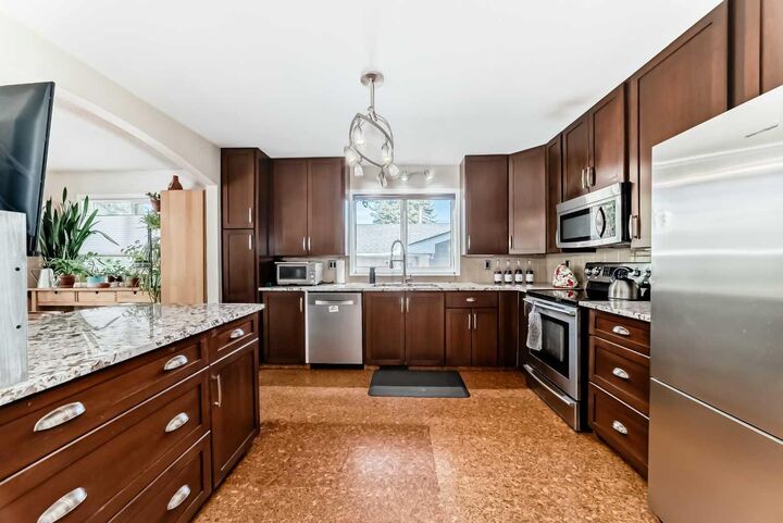 Property Photo:  1319 104 Avenue SW  AB T2W 0A7 