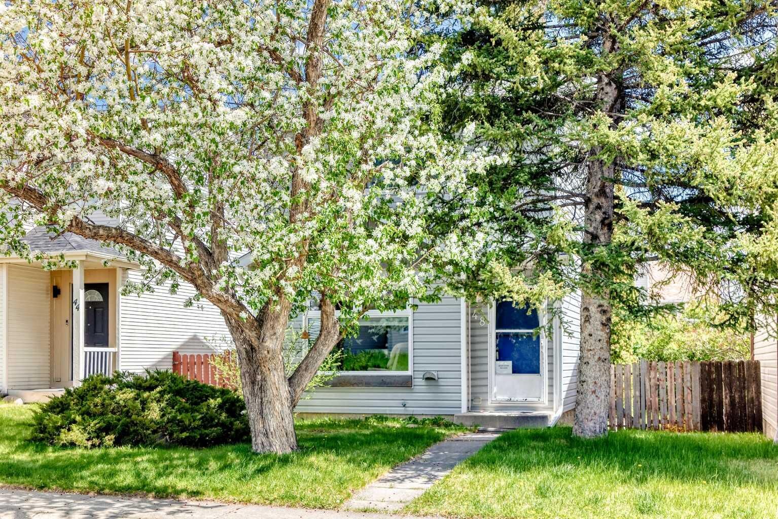 Property Photo:  48 Millcrest Way SW  AB T2Y 2J4 