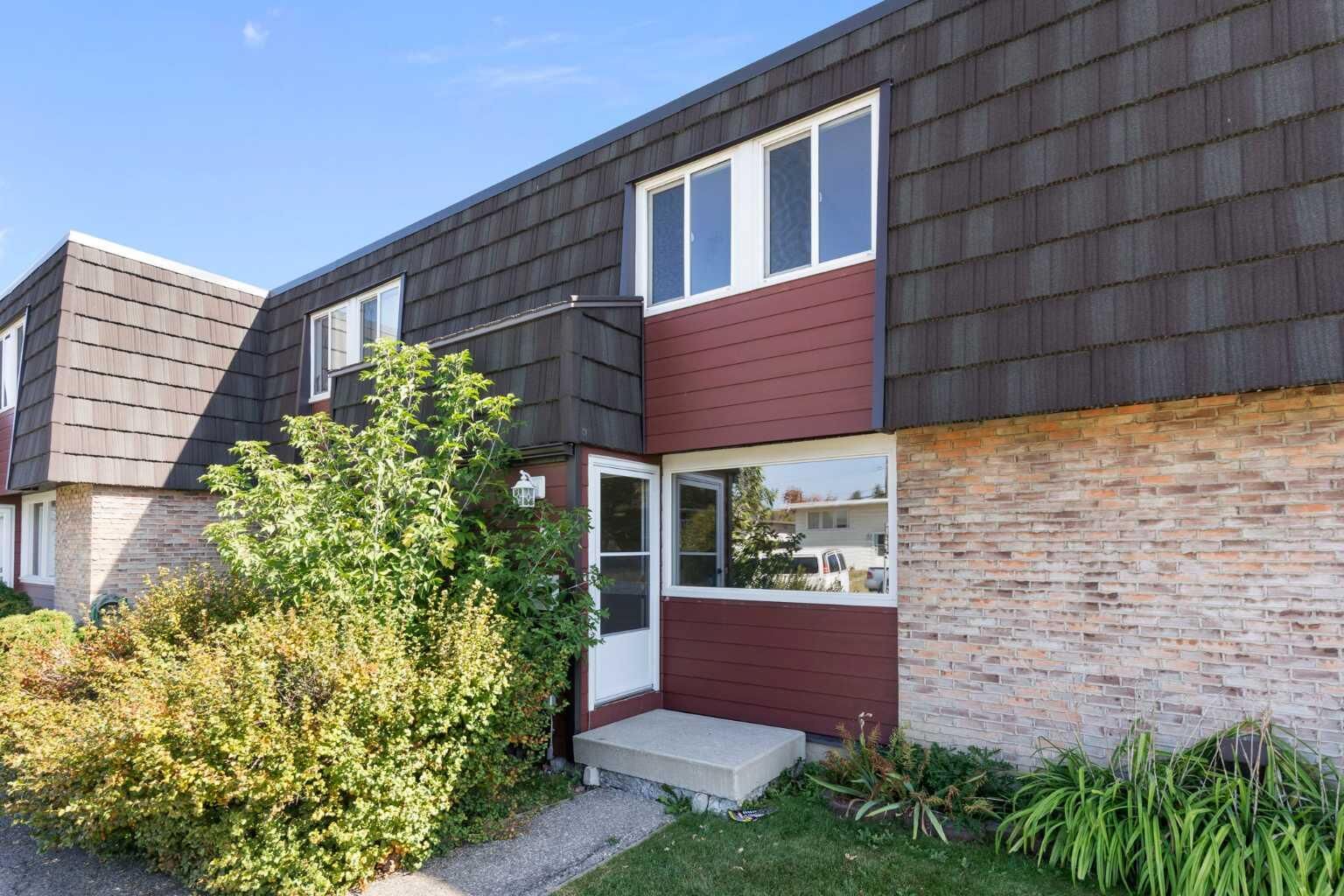 Property Photo:  80 Galbraith Drive SW 32  AB T3E 4Z6 