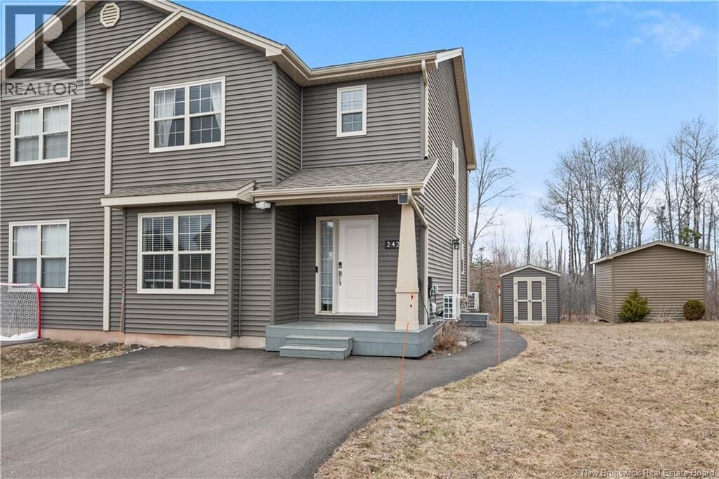 Property Photo: 242 Erinvale Drive NB E1A 9S2