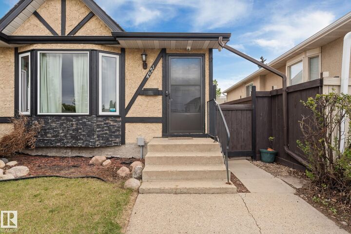 Property Photo:  4621 126 Avenue NW  AB T5A 4L1 