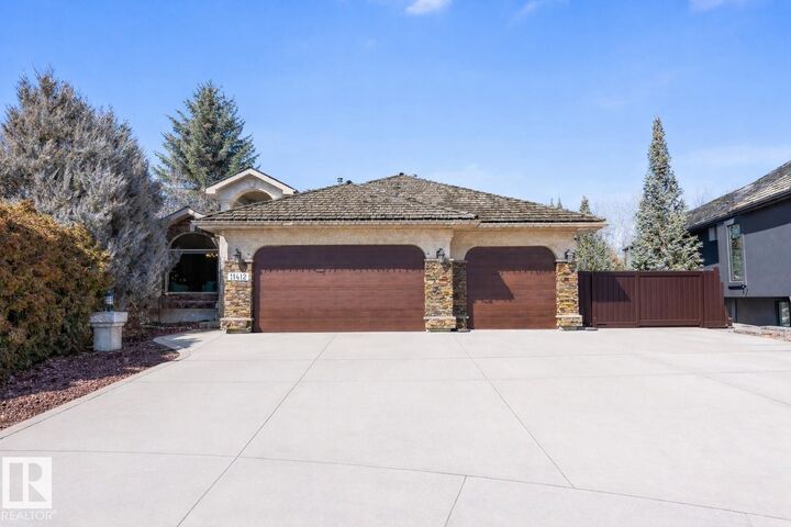 Property Photo:  11412 12 Avenue NW  AB T6J 6W8 