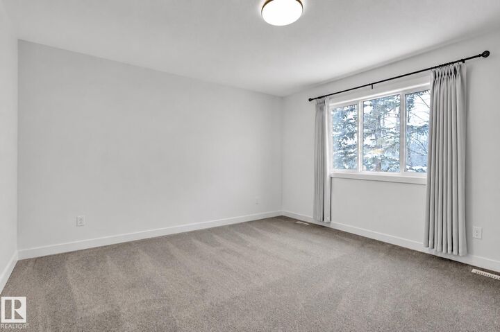 Property Photo:  5122 213A Street NW 53  AB T6M 1M6 