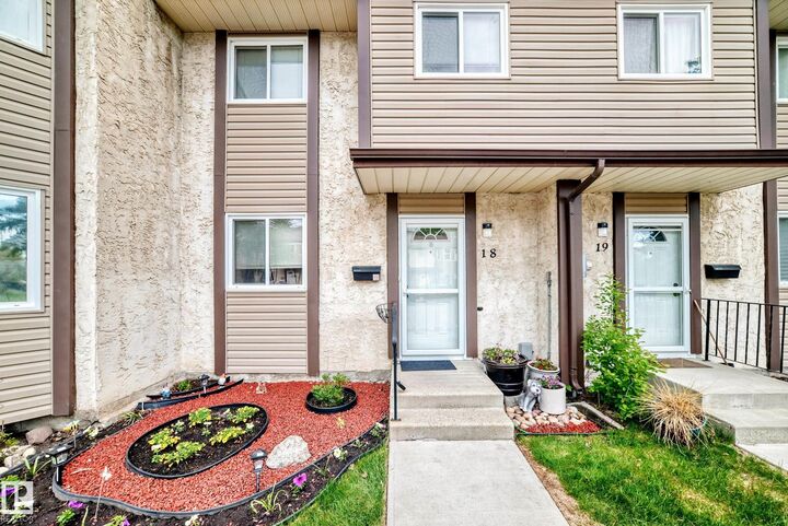 Property Photo: 10453 20 Avenue NW 18 AB T6J 5A1