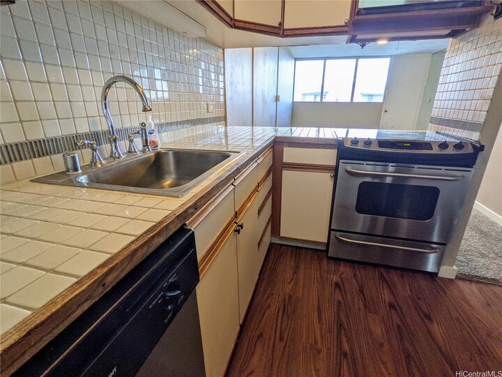 Property Photo:  46-270 Kahuhipa Street A410  HI 96744 