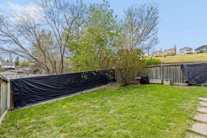 Property Photo:  242 Hidden Spring Mews NW  AB T3A 5N3 