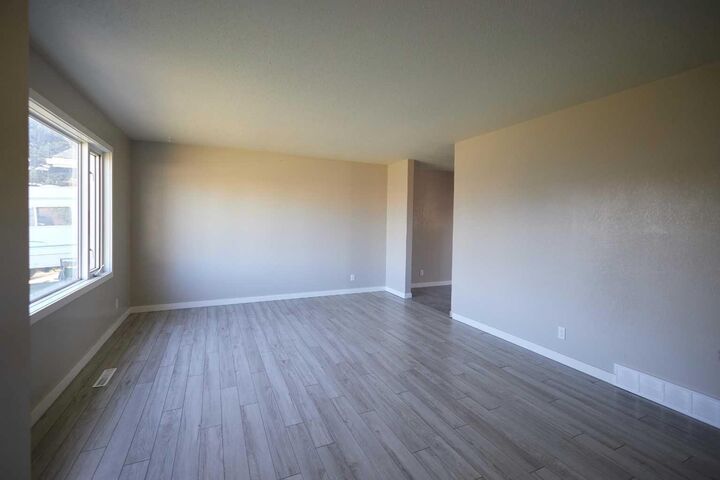 Property Photo:  2501 13 Avenue N  AB T1H 4A4 