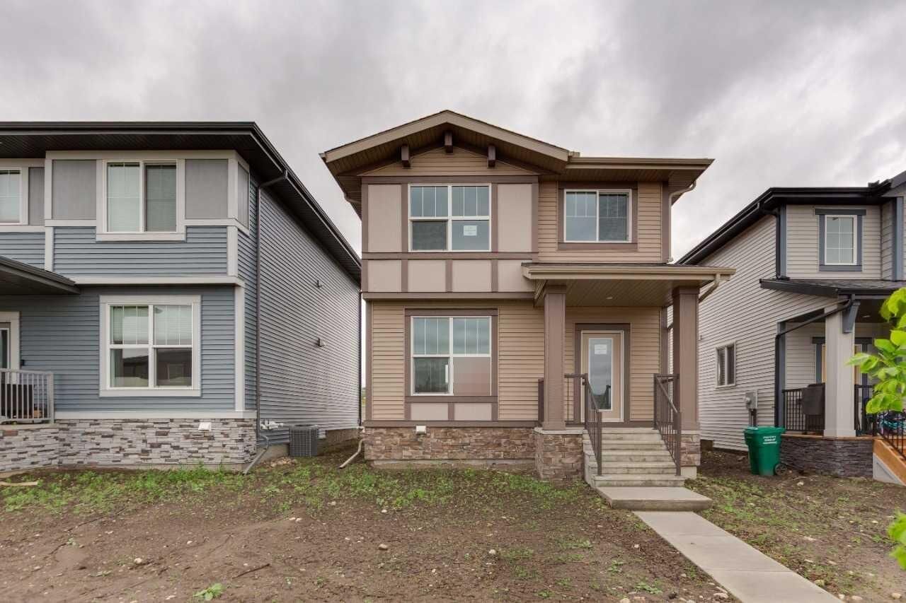 Property Photo: 422 Heartland Way AB T4C 3E5