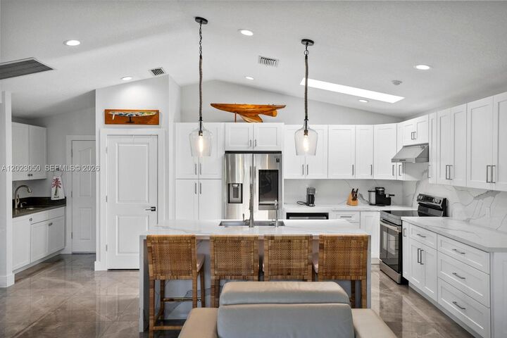 Property Photo:  8565 SE Palm St  FL 33455 