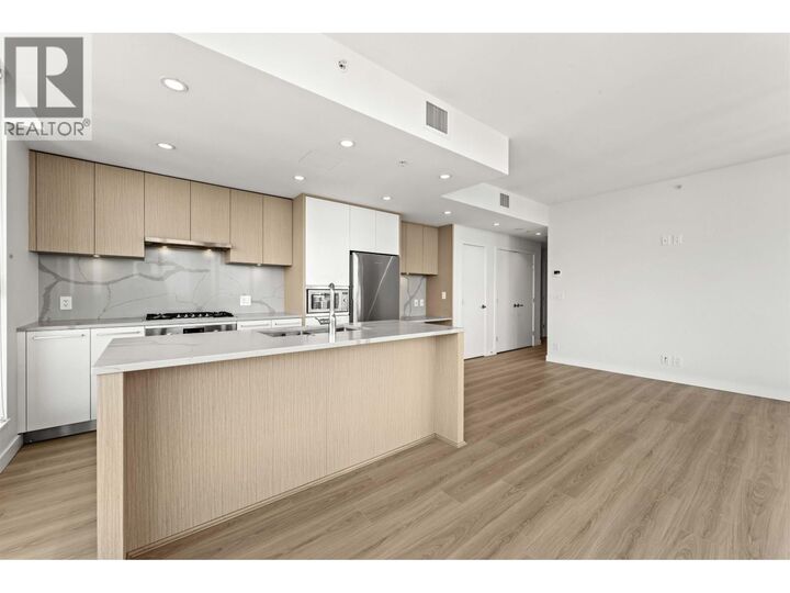 Property Photo: 567 Clarke Road 2901 BC V3J 0K7