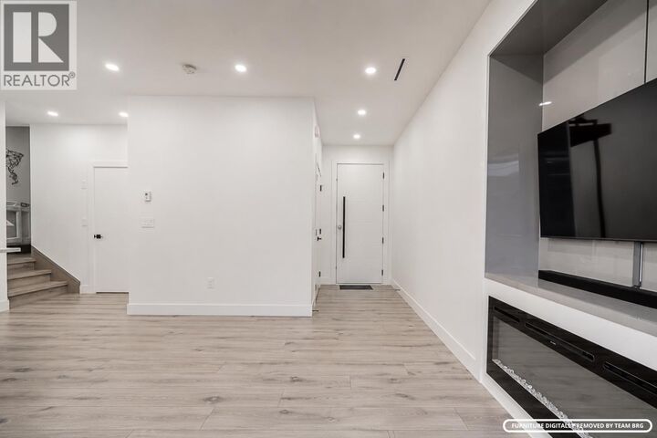 Property Photo:  4675 Canada Way #2  BC V5G 1K9 