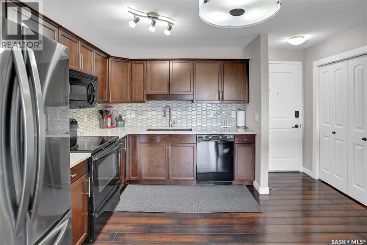 Property Photo:  310 E 1300 Stockton Street N  SK S4X 0G1 