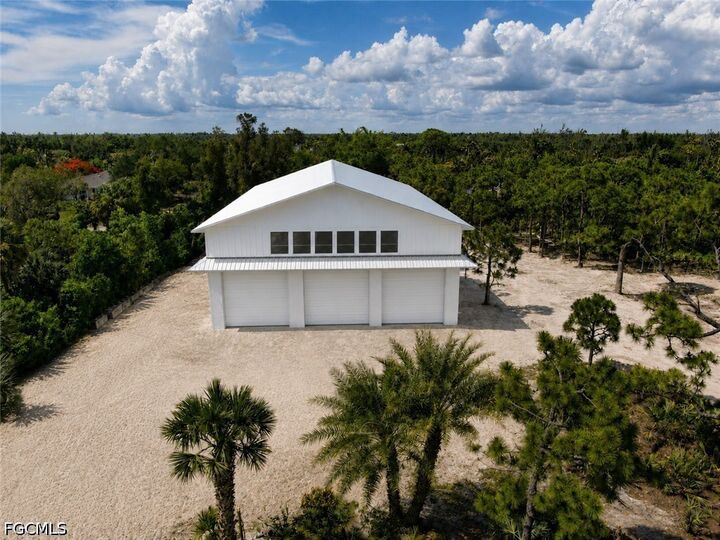 Property Photo:  6690 Pineland Road  FL 33922 