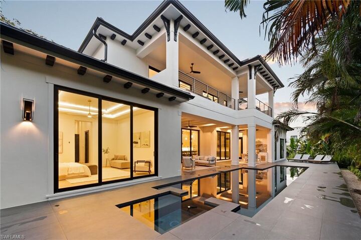Property Photo:  3840 Crayton Rd  FL 34103 