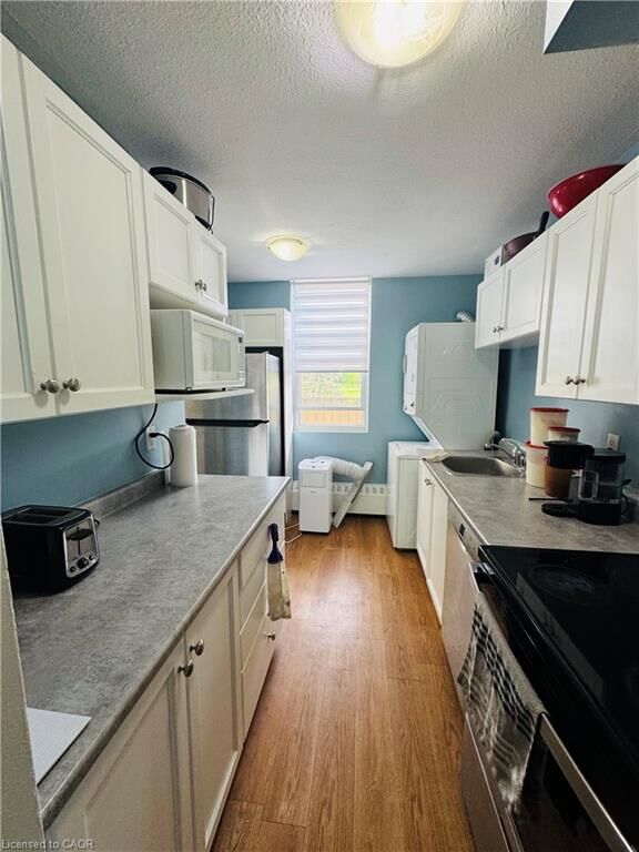 Property Photo:  350 Quigley Road 222-Bedroom#3  ON L8K 5N2 