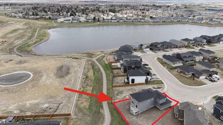 Property Photo: 65 Lakes Estates Circle AB T1P 0B6
