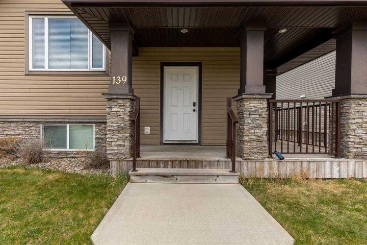 Property Photo:  139 Mt Sundial Court W Main Floor  AB T1J 5B7 