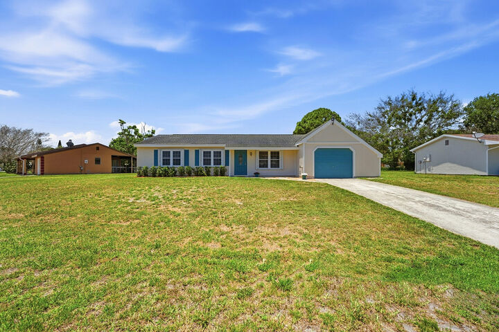 Property Photo: 450 SW Kentwood Road FL 34953