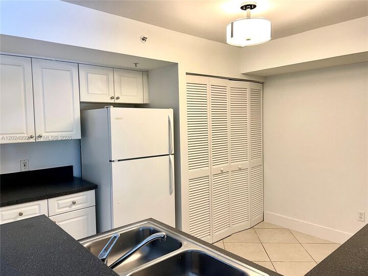 Property Photo: 150 NW 96th Ave 9-207 FL 33024
