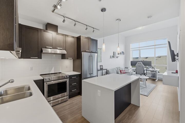 Property Photo: 5638 201A Street 511 BC V3A 0L8